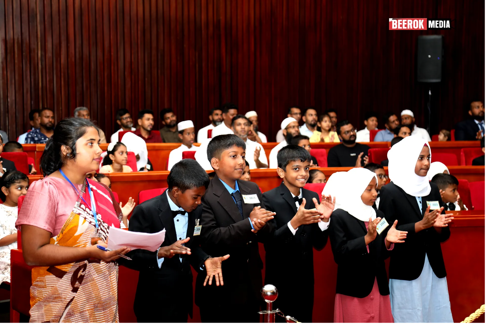 Families and students in the auditorium