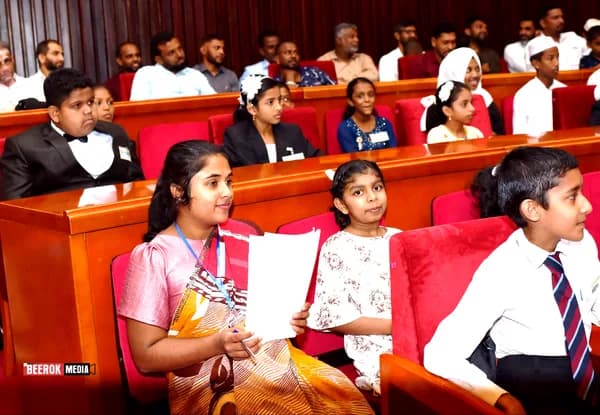 Families and students in the auditorium