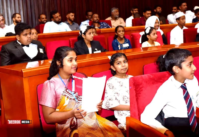 Families and students in the auditorium
